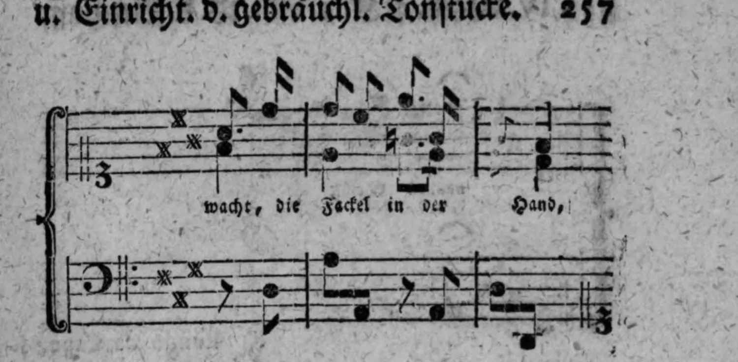 Notenbeyspiel: Couplet 2, Fortsetzung, System 2 (mit Textunterlegung »wacht, die Fackel in der Hand,«)